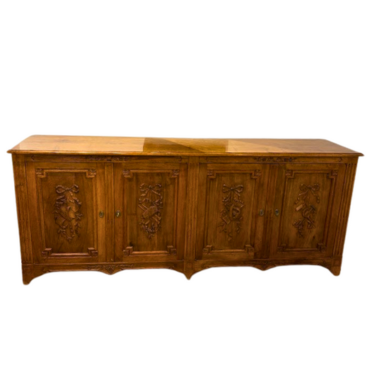 Credenza by New York Maker Don Ruseau Featuring Four Carved Panel Doors with Ribbon Motif