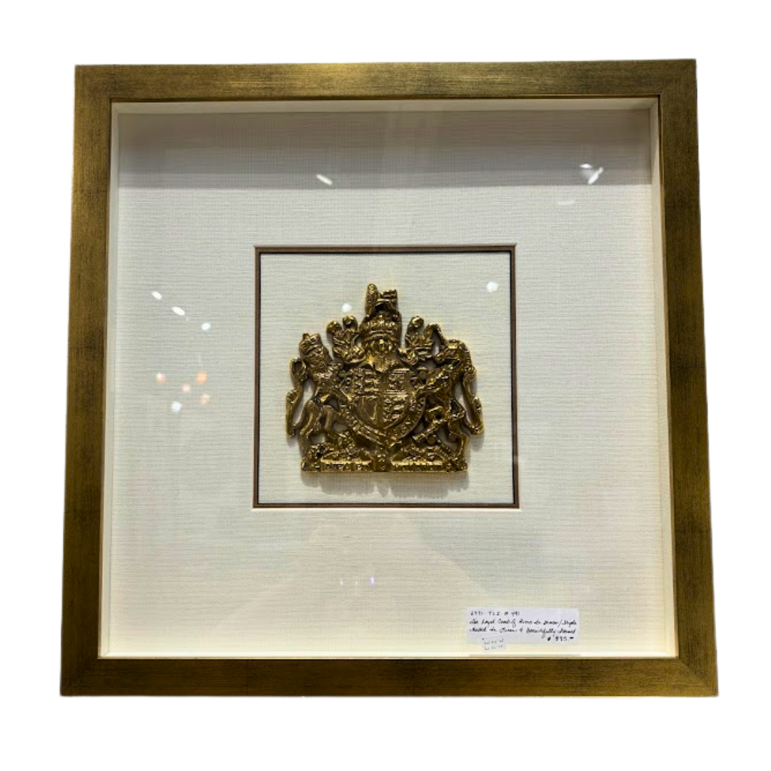 Framed gold emblem on a white background