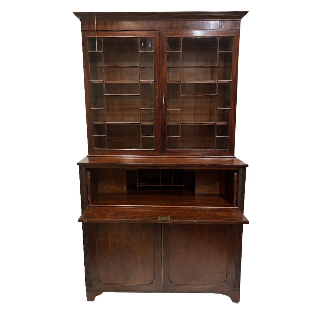 Wooden bookshelf with glass doors on a white background