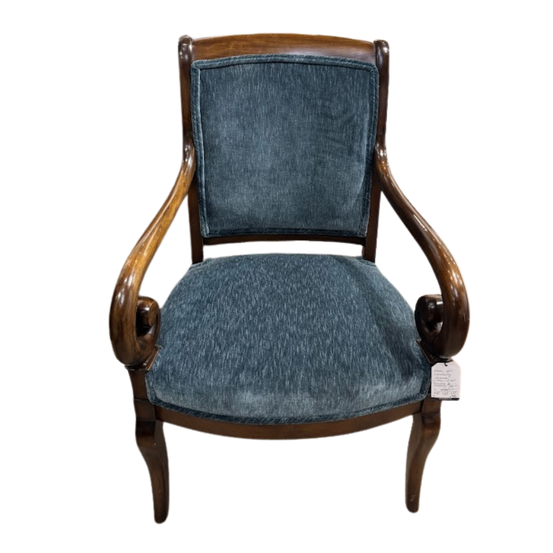 Chair with blue cushioned seat and backrest on a white background