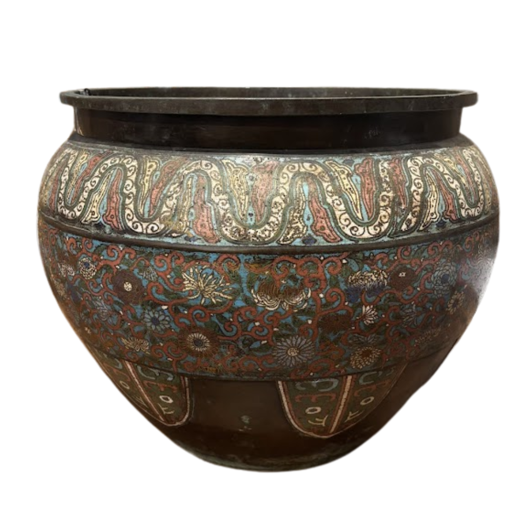Decorative pot with intricate patterns on a white background