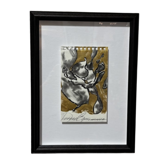 Framed artwork with a black frame on a white background