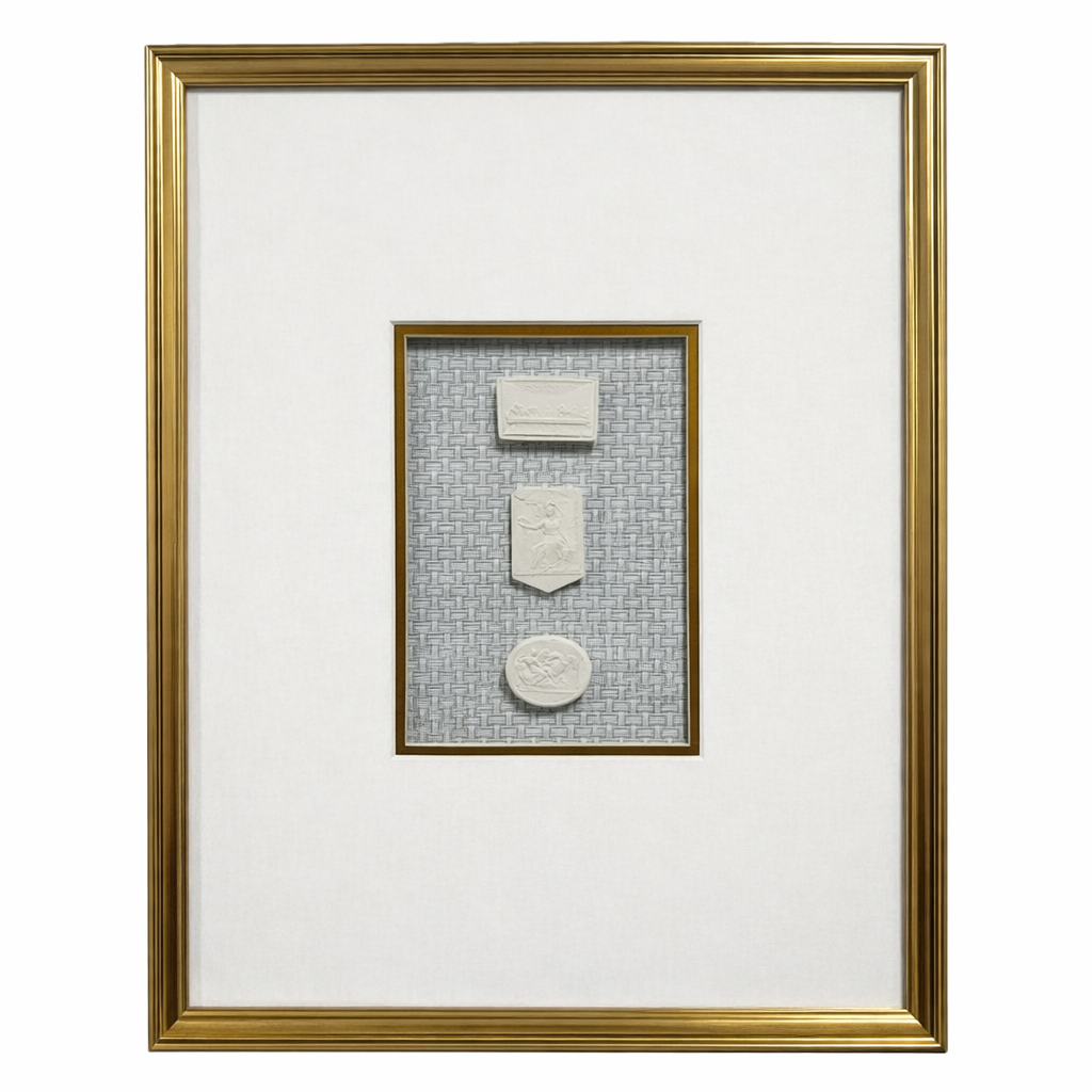 Framed artwork with two rectangular objects on a textured blue background