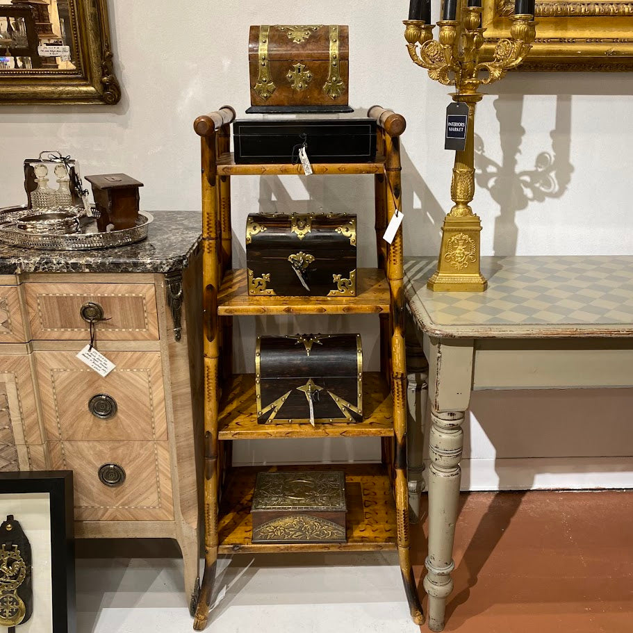 Antique étagères and vintage shelves styled with decor at Interiors Market Atlanta