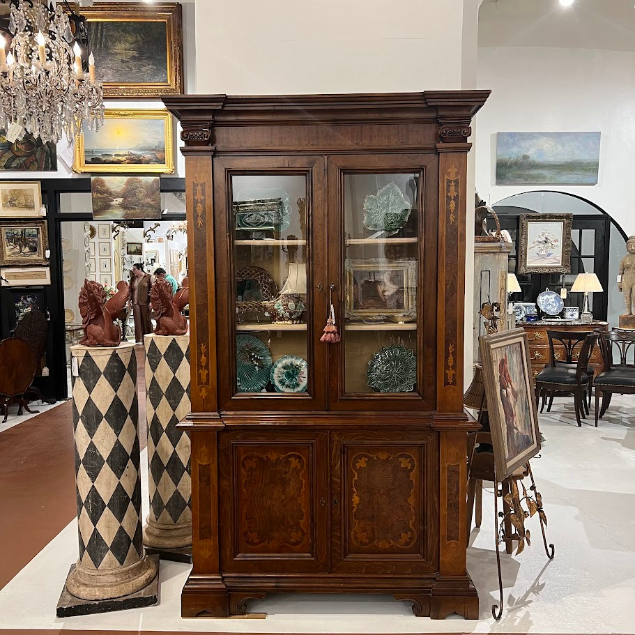 Antique armoires and vintage cabinets displayed at Interiors Market Atlanta