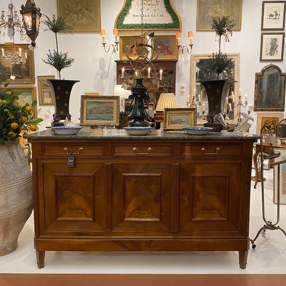 Antique sideboards and vintage enfilades on display at Interiors Market Atlanta