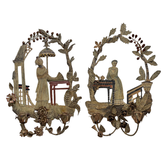 Decorative wall art pieces with intricate designs on a white background