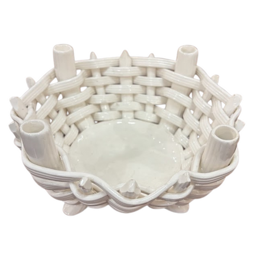 White woven ceramic bowl on a white background