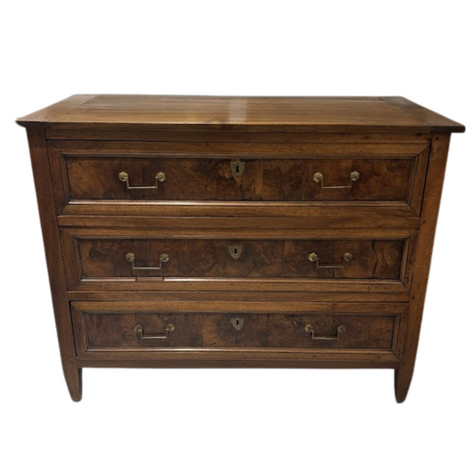 Wooden dresser with multiple drawers on a white background