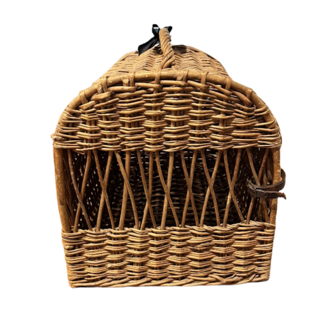 Wicker basket with a lid on a white background