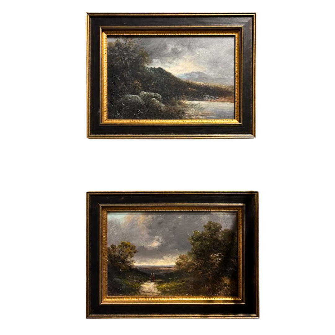 Two framed landscape paintings on a white background