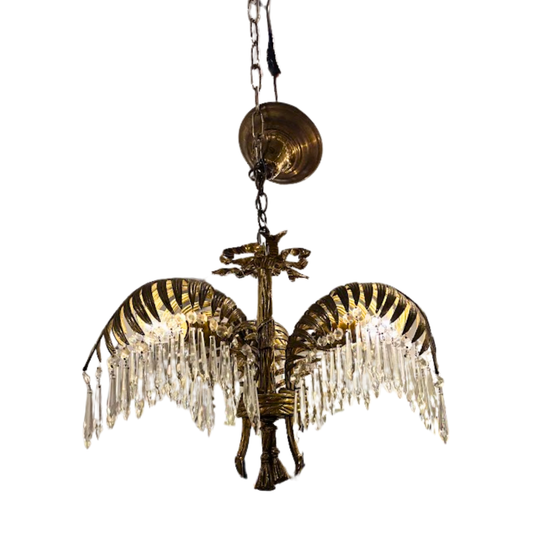 Decorative chandelier with crystal accents on a white background