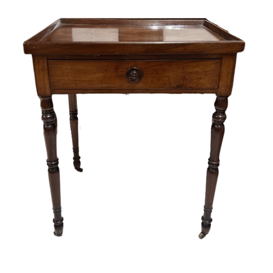 Wooden side table with a single drawer on a white background