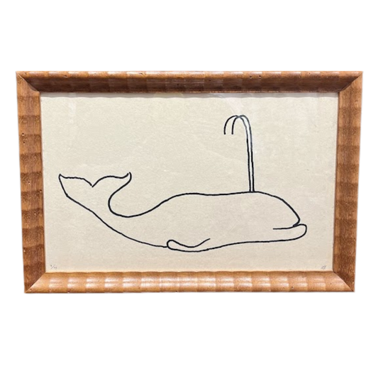 Framed artwork of a whale and hook on a white background