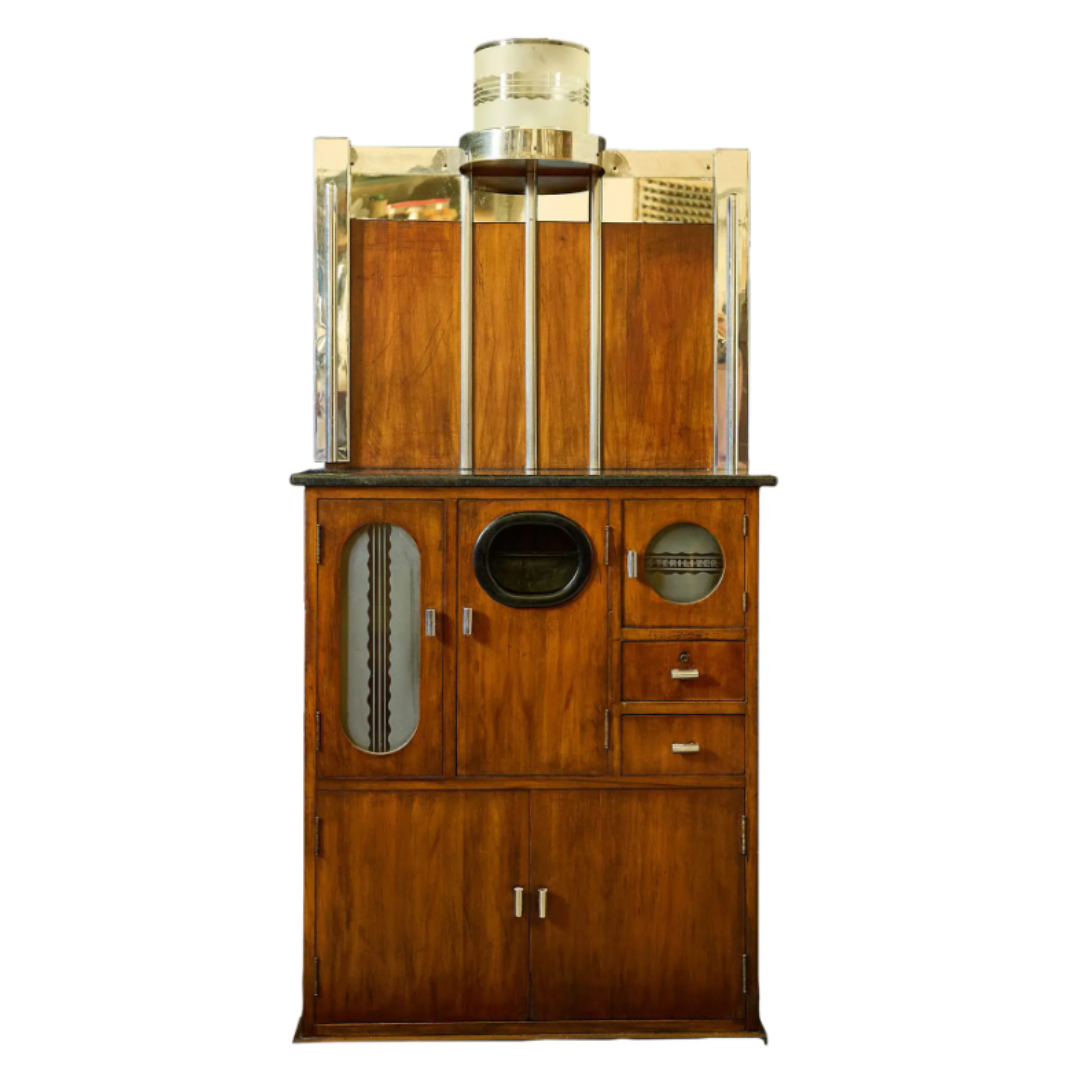 Vintage wooden barber cabinet with glass panels on a white background