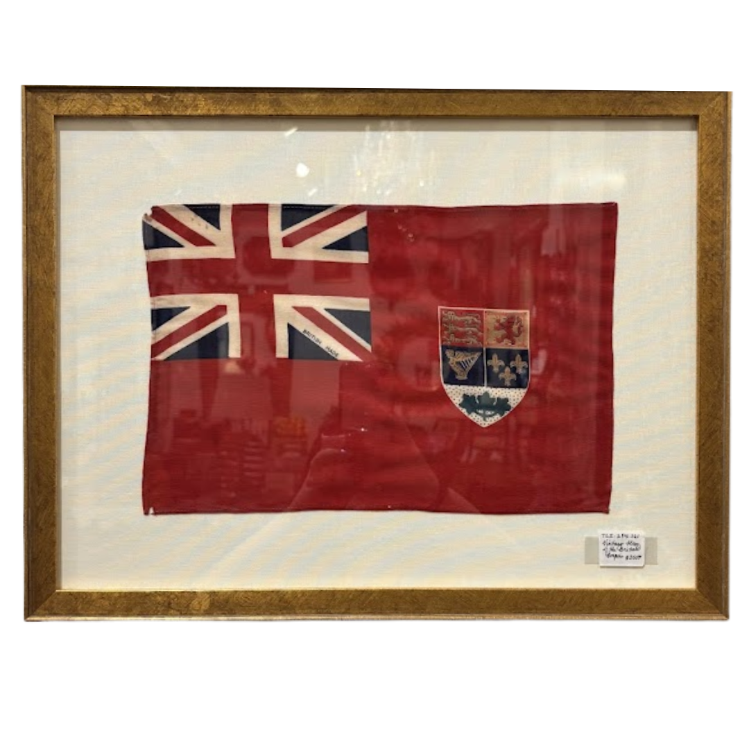 Framed flag with Union Jack and crest on a red background