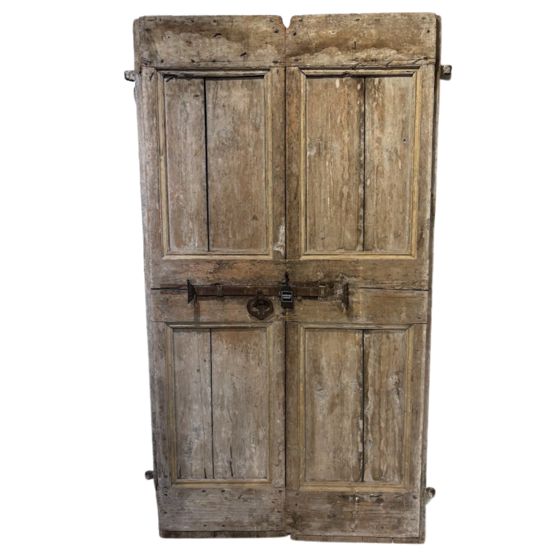 Old wooden door with a lock on a white background