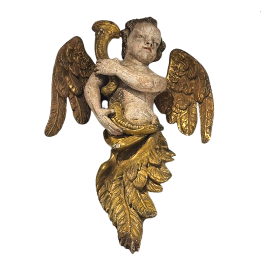 Decorative angel figure with gold wings on a white background
