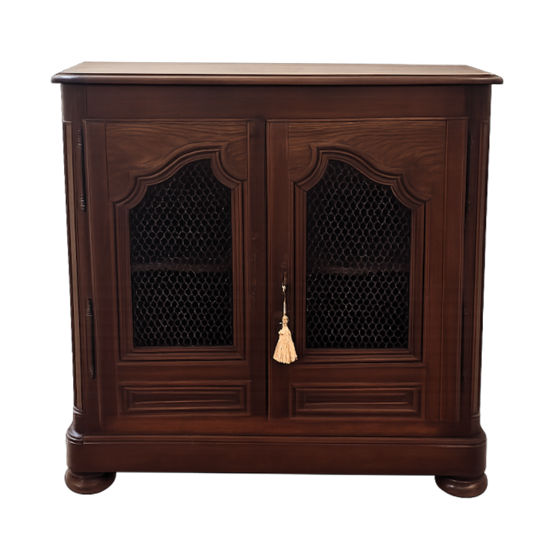 Wooden cabinet with decorative elements on a white background