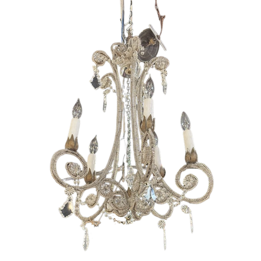 Decorative chandelier with intricate design on a white background
