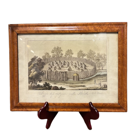 Framed black and white print of a circular structure with trees on a stand