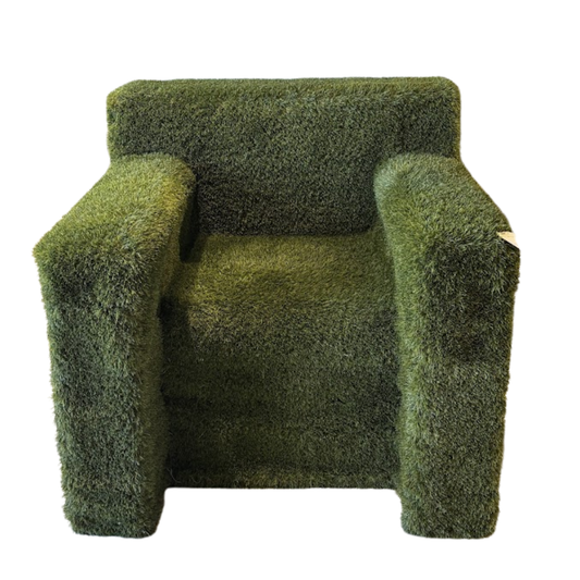 Green textured armchair on a white background