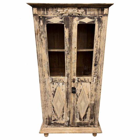 Vintage-style wooden cabinet with diamond patterns on a white background